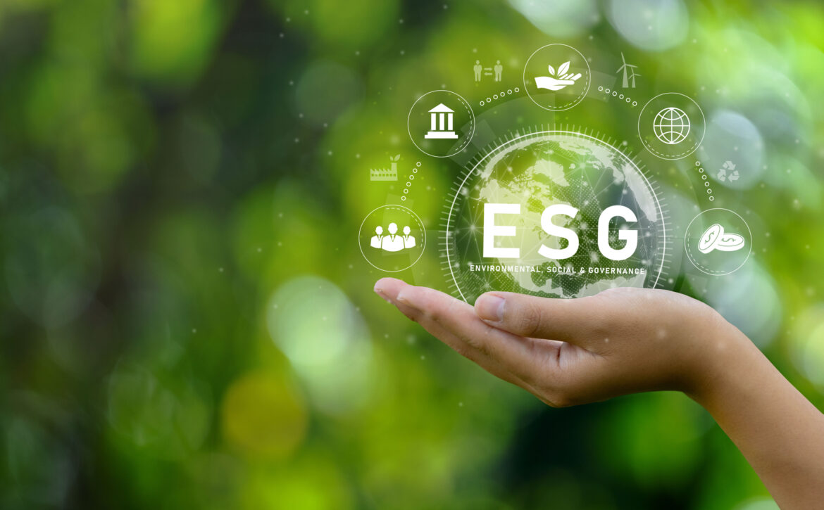 ESG icon concept. Environment in renewable hands. Nature, earth, society and governance SG in sustainable business on networked connections on green background. environmental icon